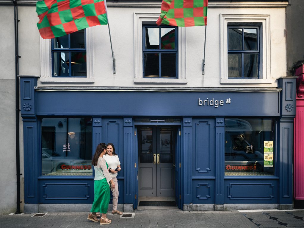 The Bridge St front on Bridge Street, Mayo flags flying